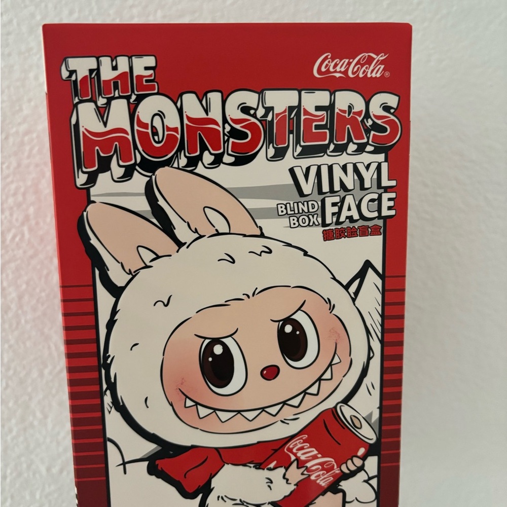 The monsters Coca-Cola Pop Mart Vinyl face blind box

100% authentic